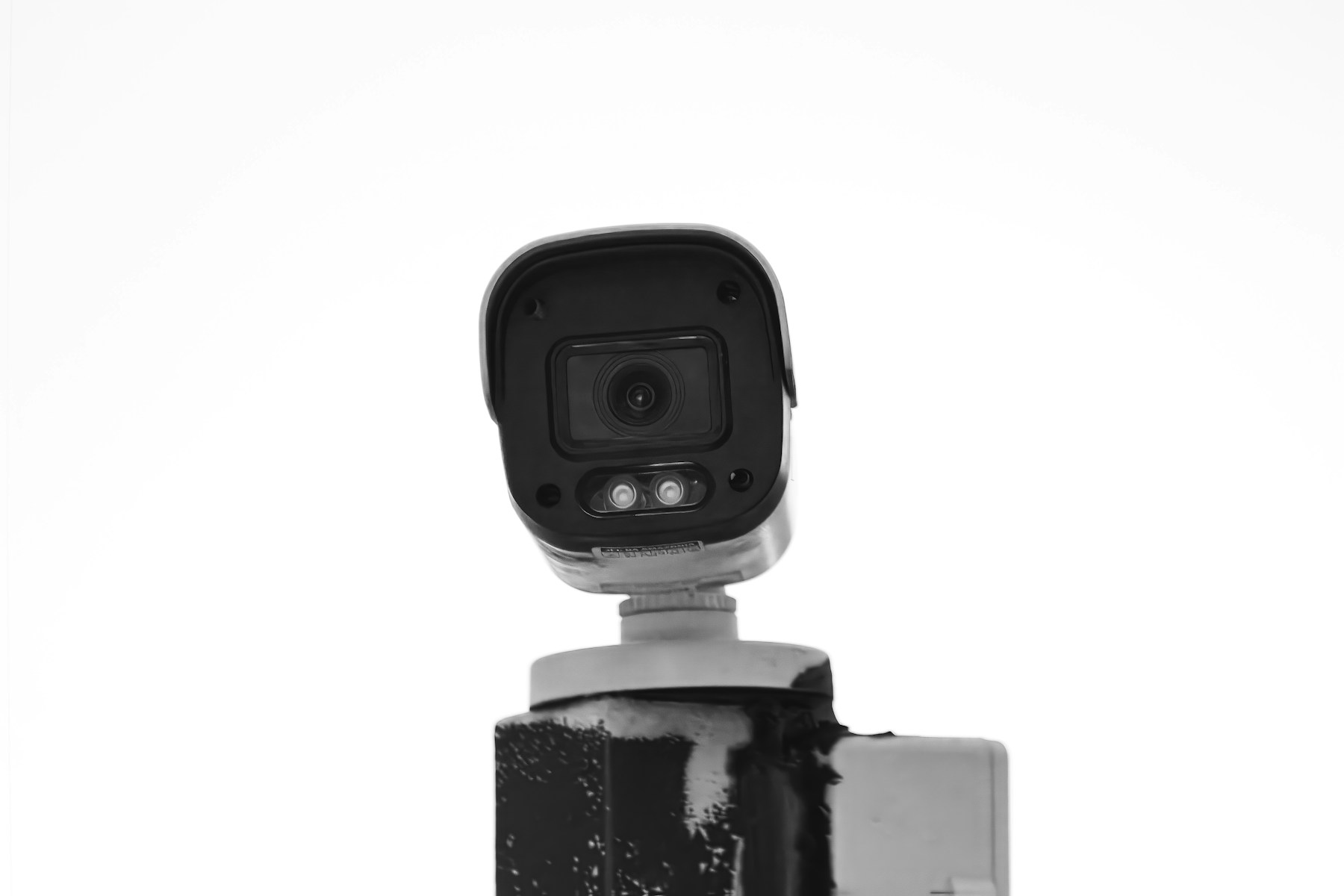 A security camera mounted on a post