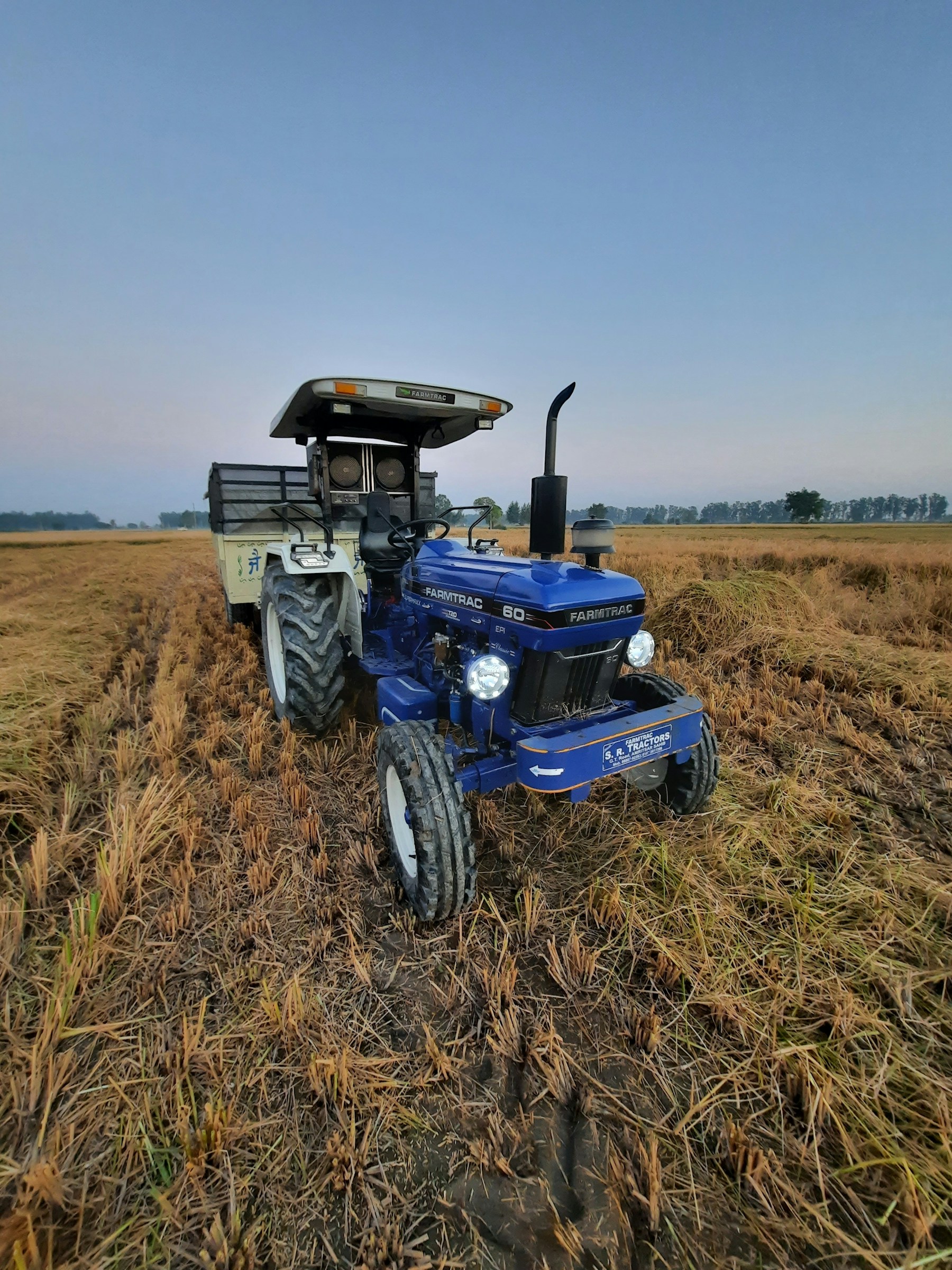 Working farm machinery in a field